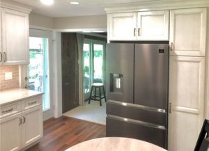 kitchen remodel uses black stainless appliances