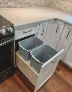 double trash pull out in remodeled kitchen