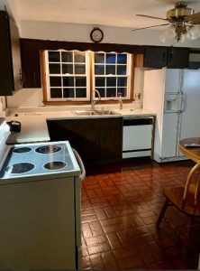Dark dated kitchen cabinets need a kitchen remodel
